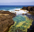 sky cloudy beach light water in lanzarote