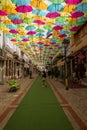 The sky of colored umbrellas. Street with umbrellas. Umbrella sky project in Agueda