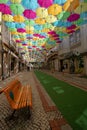 The sky of colored umbrellas. Street with umbrellas. Umbrella sky project in Agueda