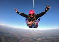 Sky dive tandem friends at the sunset Royalty Free Stock Photo