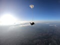 Sky dive tandem friends at the sunset Royalty Free Stock Photo