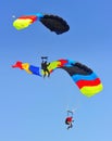 Sky divers with colorful parachutes Royalty Free Stock Photo