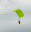 Sky diving tandem parachutists gliding toward landing Royalty Free Stock Photo