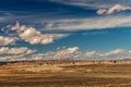 The sky domination over the desert landscape, with roads running through it, Wahweap. Beautiful Colorado river basin, Arizona, USA