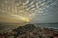 Sky effect sunset on seaface rock Royalty Free Stock Photo