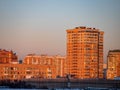 The tops of the golden houses are painted the golden color of the rising sun Royalty Free Stock Photo