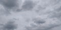 The sky and gray clouds in the daytime while the rain is falling near for natural or abstract