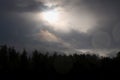 The sky in gray clouds over the forest, a gloomy landscape Royalty Free Stock Photo