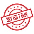 SKY ISN T BLUE text written on red vintage round stamp