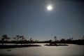 Moon rise observingn over swamp in Latvia Royalty Free Stock Photo