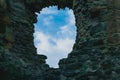 Sky through a old castle window Royalty Free Stock Photo