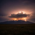 Sky over a mountain range, with dark clouds creating a striking Royalty Free Stock Photo