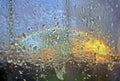 Sky with rainbow behind the glass wet with drops after rain Abstract natural photo of rainbow, rainbowscape Royalty Free Stock Photo