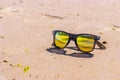 Sky is reflected in sunglasses, beach Royalty Free Stock Photo