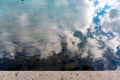 Sky reflecting on dark water, Marne River, France Royalty Free Stock Photo