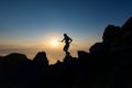 Sky runner in silhouette at sunset among the rocks Royalty Free Stock Photo