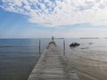 Man jumps on the pier Royalty Free Stock Photo