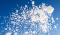 Sky with snow. Sky with snow crystals. Winter pattern with snow. Frost crystals on blue sky. Royalty Free Stock Photo