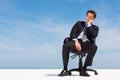 Sky, space and a business man thinking on a chair for planning with vision for the future of his company. Corporate Royalty Free Stock Photo