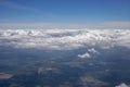 Sky with stormy white clouds over Ukraine view from the airplane window Royalty Free Stock Photo