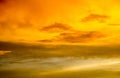 The sky after a summer thunderstorm. Orange cumulus clouds. Sunset. Royalty Free Stock Photo