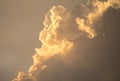 The sky after a summer thunderstorm. Orange cumulus clouds. Sunset. Royalty Free Stock Photo