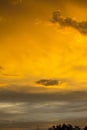 The sky after a summer thunderstorm. Orange cumulus clouds. Sunset. Royalty Free Stock Photo