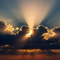 Sky with the sun setting behind dark clouds, creating radiant light Royalty Free Stock Photo
