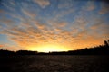 Sunset observingn over fields in Latvia