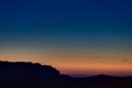 The sky at sunset over the hills in the foothills Royalty Free Stock Photo