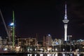 Sky Tower and other buildings by night
