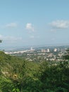 Sky and Town with green mountains