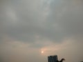 Sky view, sun moving to grey cloud