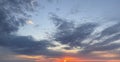 Sky wide panorama with sunset and clouds. Horizontal cloudscape nature background Royalty Free Stock Photo