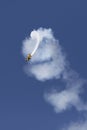 Skyaces plane performing Aerobatics with a smoke trail