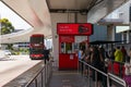 Skybus bus stop with ticket office and people in a queue in Melbourne airport Royalty Free Stock Photo