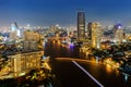 Skycrapper view of Bangkok city with rive at night time. Royalty Free Stock Photo