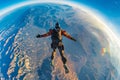 Exhilarating Freefall Over Rugged Terrain During A High-Altitude Skydive At Dawn Royalty Free Stock Photo