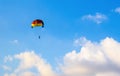 Skydiver high in the blue sky white clouds extreme vacation Royalty Free Stock Photo