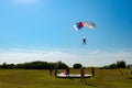 Skydiver jumper is landing with parachute