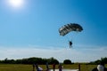 Skydiver jumper is landing with parachute