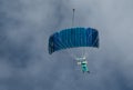 A skydiver performing skydiving with parachute Royalty Free Stock Photo