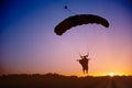 Skydiver silhouette under parachute Royalty Free Stock Photo