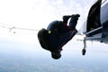 Skydiver tumbles out of an airplane