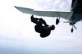 Skydiver tumbles out of an airplane