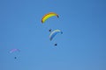 Skydivers on a blue sky background Royalty Free Stock Photo