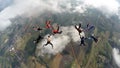 Skydivers making two circles Royalty Free Stock Photo