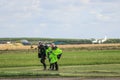 skydivers with parachutes after jump Royalty Free Stock Photo