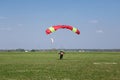 Skydivers parachutist on blue sky on sunset