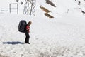 Skydiving coach carried parachute and walking to the starng point